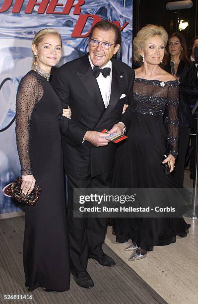 Roger Moore with his wife, Christina Tholstrup, and daughter, Christina Knudsen, attending the Royal Gala Premiere of "Die Another Day."