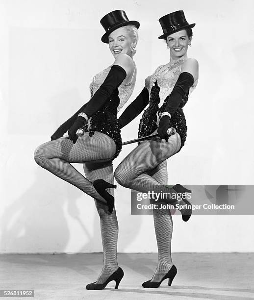 Lorelei Lee and Dorothy Shaw dance with top hats and canes in Gentlemen Prefer Blondes.