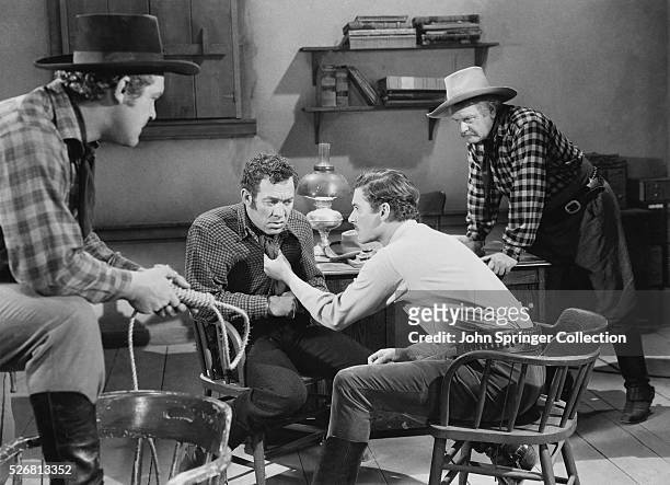 Errol Flynn Grabbing Ward Bond by His Shirt in Dodge City