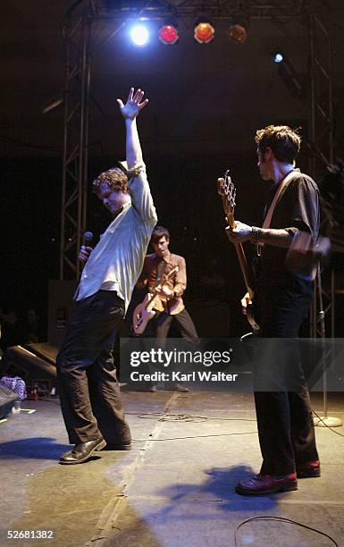 Singer Dick Valentine, the Colonel and John R. Dequindre of Electric Six perform at the El Rey Theatre on April 21, 2005 in Los Angeles, California.