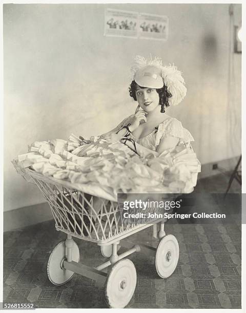 Mabel Normand Sitting in Baby Carriage