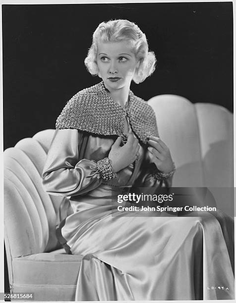 Lucille Ball Modeling a Satin Robe