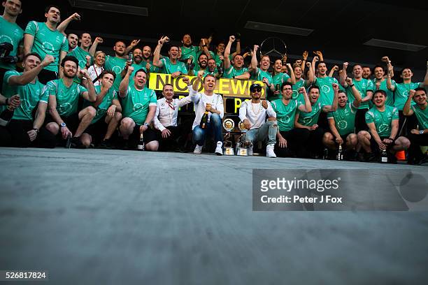 Nico Rosberg of Germany and Lewis Hamilton of Great Britain both of Mercedes celebrate finishing 1st & 2nd during the Formula One Grand Prix of...