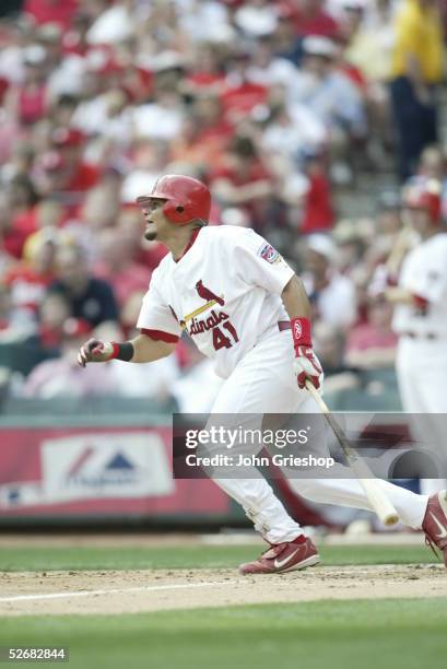 Yadier Molina of the St. Louis Cardinals bats during the game between the St. Louis Cardinals and the Philadelphia Phillies at Busch Stadium on April...