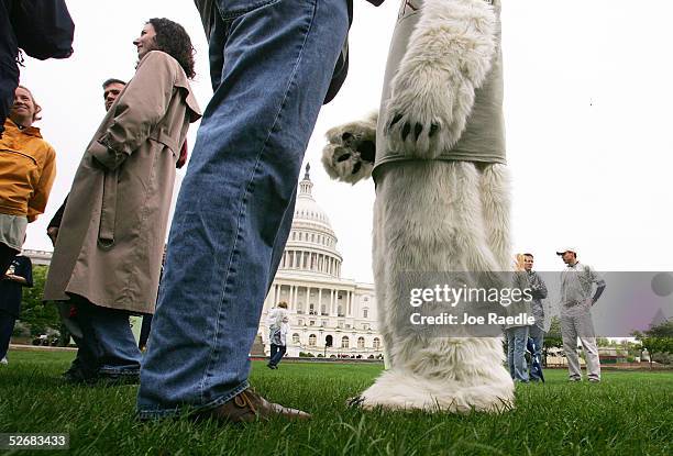 Michael Degnan from the Alaska Wilderness League, dressed as a polar bear, stands with others during an event sponsored by Ben and Jerry's ice cream...