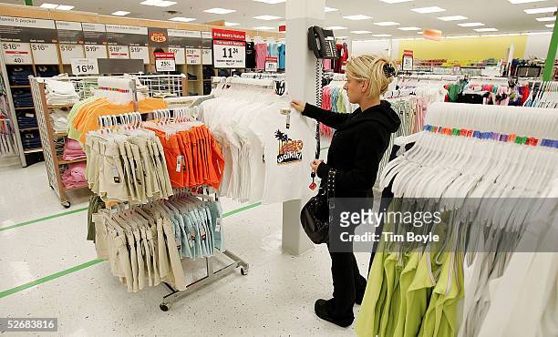 Jelena Graovac shops for women's clothing in a newly revamped Kmart store April 22, 2005 in Norridge, Illinois. The store is one of nine test stores...