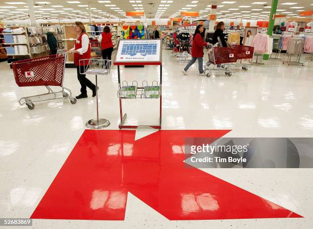 Large Kmart logo sits on the floor of a newly revamped Kmart store April 22, 2005 in Norridge, Illinois. The store is one of nine test stores where...