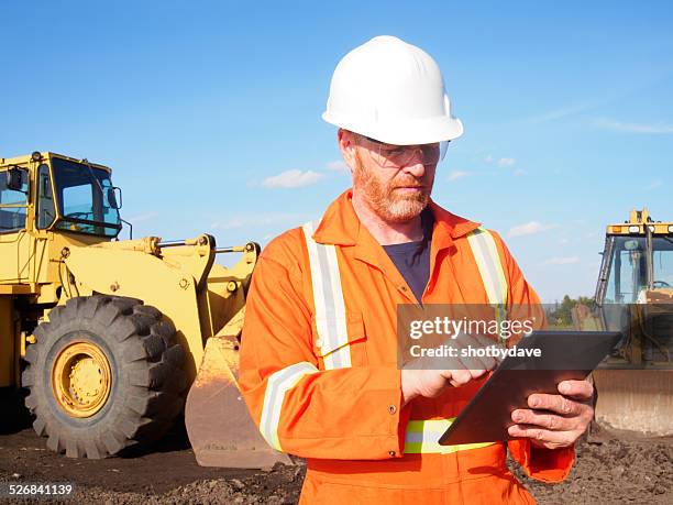 Contractor On Computer Contractor In Vehicle Tablet Photos and Premium High Res Pictures ...