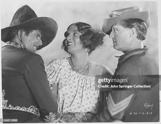 Warner Baxter, Dorothy Burgess, and Edmund Lowe in a promotional photograph for the 1929 film In Old Arizona.