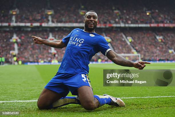 Wes Morgan of Leicester City celebrates scoring his team's opening goal during the Barclays Premier League match between Manchester United and...