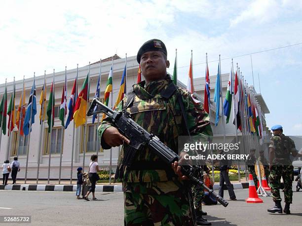 Indonesian soldiers stand guard in front of Merdeka building, where summit golden jubilee will be held in Bandung, 23 April 2005. Representatives...