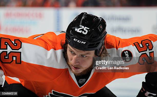 Ryan White of the Philadelphia Flyers prepares to face-off against the Washington Capitals in Game Six of the Eastern Conference First Round during...