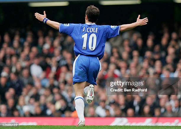 Joe Cole of Chelsea runs towards the bench in celebration after scoring the first goal of the game during the Barclays Premiership match between...