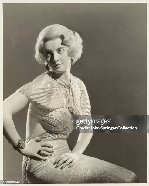 Actress Bette Davis Wearing Shimmering Gown