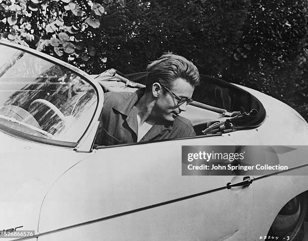 James Dean Seated in his Roadster