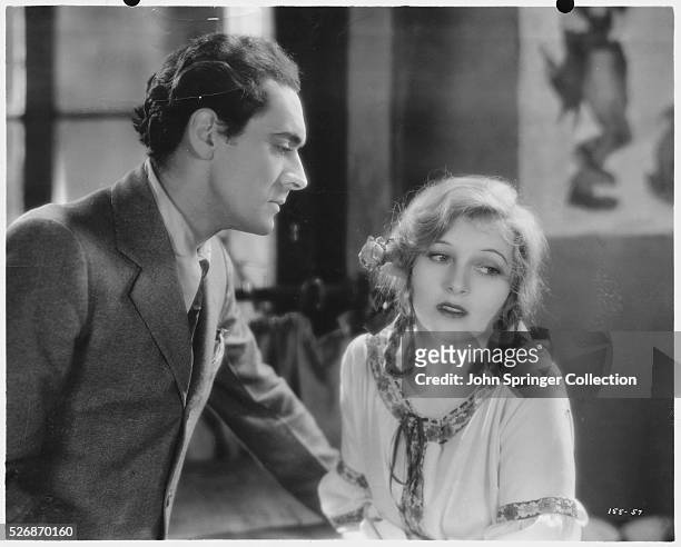 Corinne Griffith appears with Ian Keith in the 1929 drama, Prisoners.