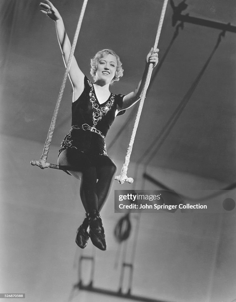 Actress Marion Davies on a Trapeze