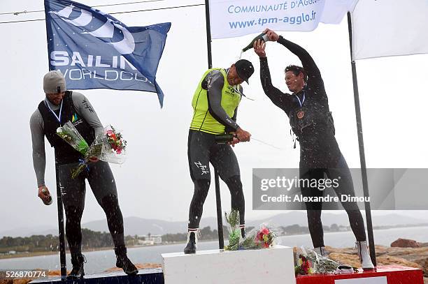 Oliver Tweddell of Australia and Jake Lilley of Australia and Jonathan Lobert of France compete in the Laser race boat during the Sailing World Cup...