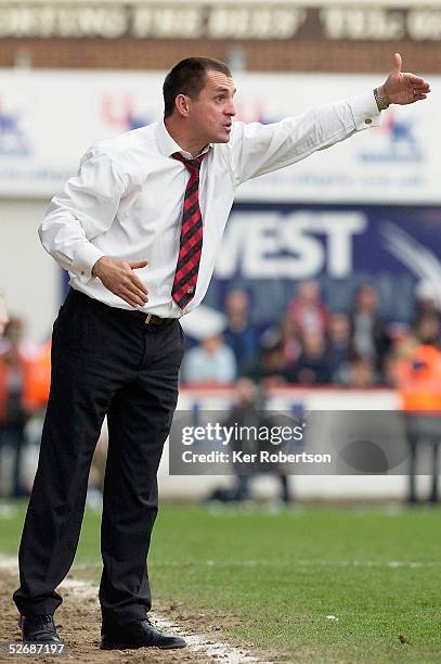 Martin Allen the Brentford manager shouts instructions during the Coca-Cola League One match between Brentford and Huddersfield Town at Griffin Park...