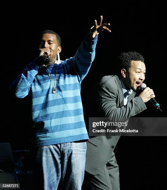 Musician John Legend and rapper Kanye West perform on the Alicia Keys "Diary Tour", at Radio City Music Hall April 22, 2005 in New York City.