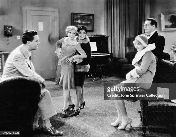 Cast of Broadway Melody of 1929, Charles King, Bessie Love, Mary Doran, Anita Page, and Nacio Herb Brown.