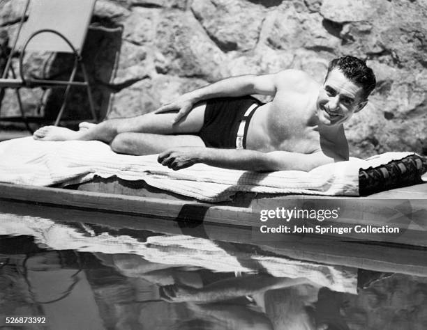 Actor John Gilbert Sunbathing