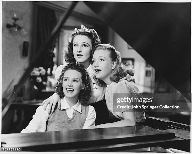 Lane Sisters Singing at a Piano
