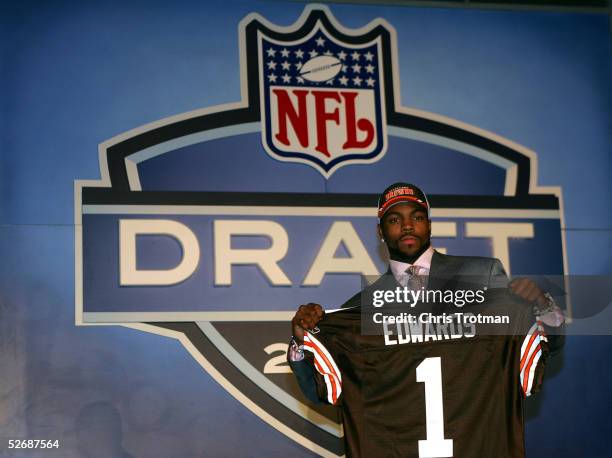 Wide receiver Braylon Edwards poses with his jersey after being drafted third overall by the Cleveland Browns during the 70th NFL Draft on April 23,...