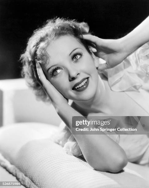 Actress Ida Lupino Reclining on Sofa