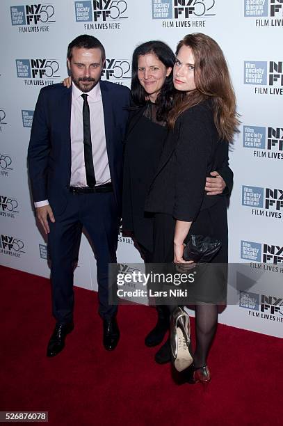 Jeremy Scahill and Laura Poitras attend the "Citizenfour" premiere during the 52nd New York Film Festival at Alice Tully Hall in New York City. �� LAN