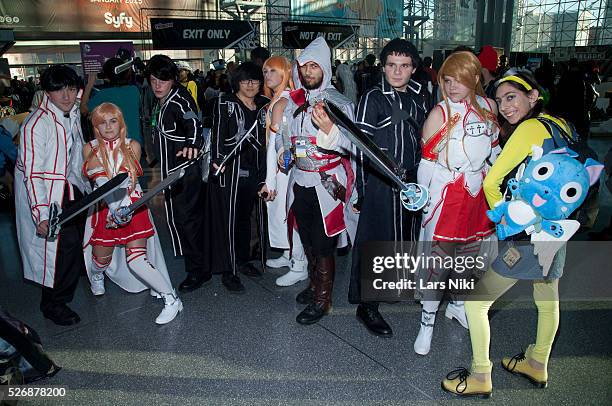 Fans pose during the New York Comic Con at the Jacob Javits Convention Center in New York City. �� LAN