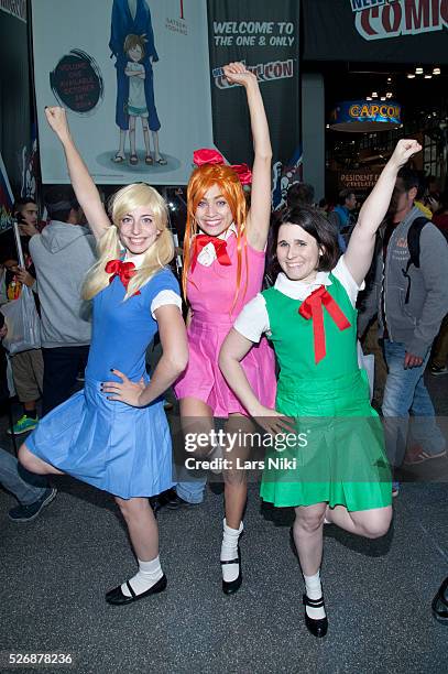 Fans pose during the New York Comic Con at the Jacob Javits Convention Center in New York City. �� LAN