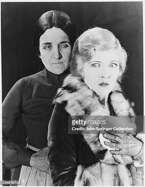 Laura La Plante as Annebelle West and Martha Mattox as Mammy Pleasant in the 1927 film, The Cat and the Canary.