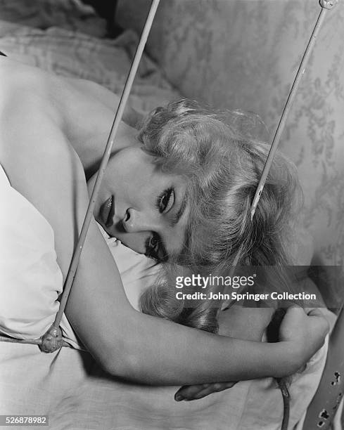 Actress Diane McBain Lying on Bed