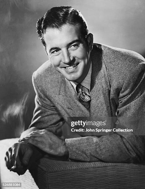 Actor John Payne with Cigarette