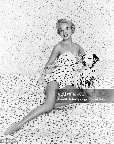 Actress Jane Powell with Dalmatian