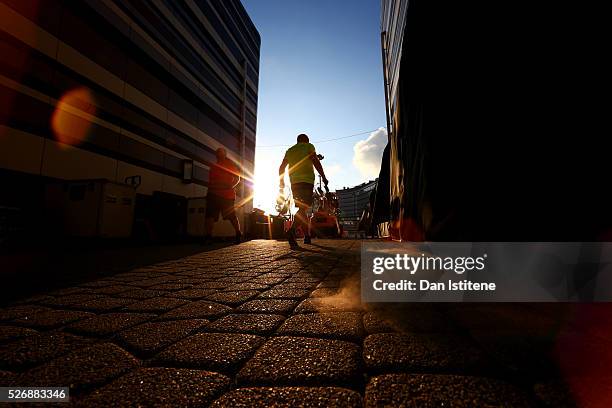 Member of the Red Bull Racing team carries equipment through the paddock as the team packs down after the Formula One Grand Prix of Russia at Sochi...