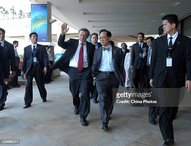 Austrian chancellor Wolfgang Schuessel and Donald Tsang , Acting Chief Executive of Hong Kong, leave the opening ceremony of the Boao Forum For Asia...