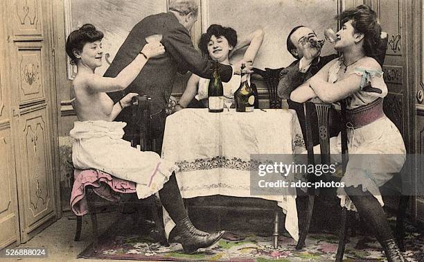 Representation of a scene in a brothel . Ca. 1900.