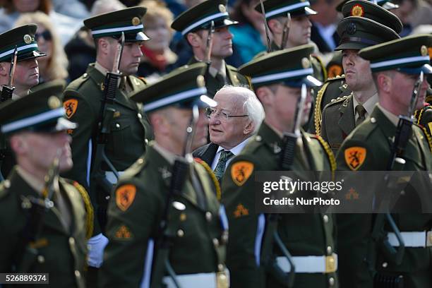 Irish President Michael D Higgins inspects the Guard of Honneur at the 1916 Easter Rising ceremony as Ireland marks its 1916 Easter Rising centenary...