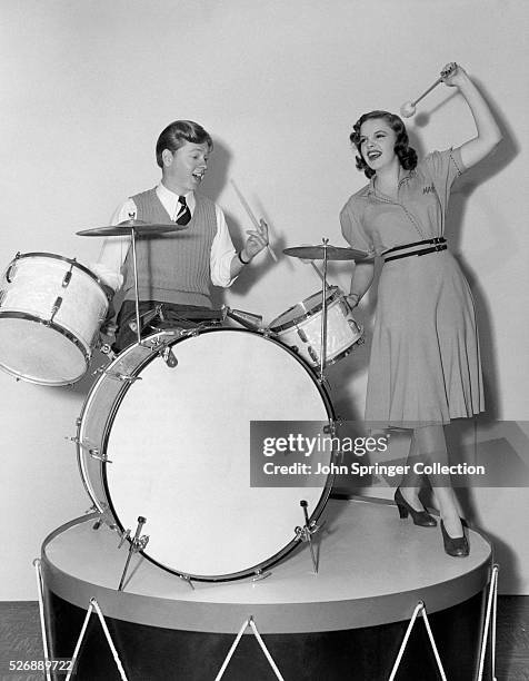 Mickey Rooney and Judy Garland, stars of Babes in Arms, star in the MGM musical Strike Up the Band. With songs like "Our Love Affair," "Nobody,"...