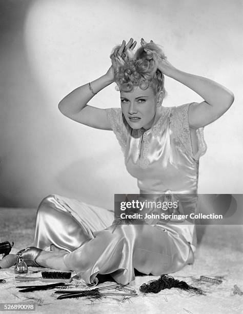 Penny Singleton Combing Hair with Hands