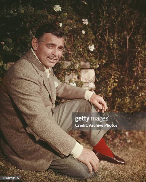 American actor Clark Gable wearing red socks, circa 1955.