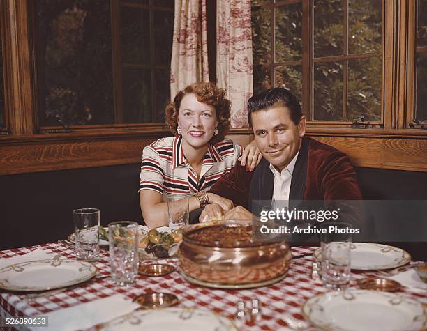 Canadian-born American actor Glenn Ford with his wife, actress Eleanor Powell , circa 1958.