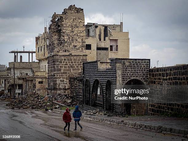 Images of daily life in one of the streets which have been shelled by Syrian government forces during the rain. March 28, 2016.