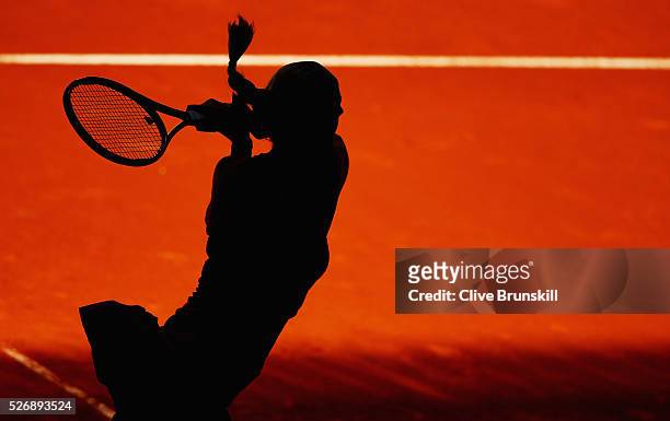 Petra Kvitova of the Czech Republic in action against Lara Arruabarrena of Spain in their first round match during day two of the Mutua Madrid Open...