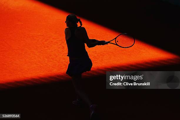 Petra Kvitova of the Czech Republic in action against Lara Arruabarrena of Spain in their first round match during day two of the Mutua Madrid Open...