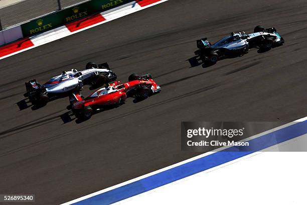 Nico Rosberg of Germany driving the Mercedes AMG Petronas F1 Team Mercedes F1 WO7 Mercedes PU106C Hybrid turbo, leads Kimi Raikkonen of Finland...