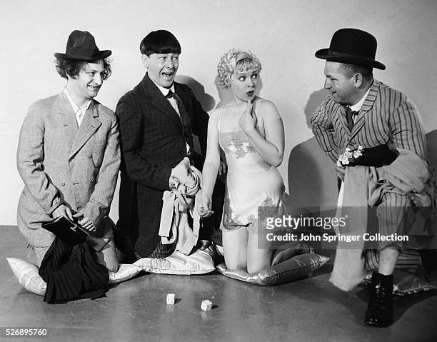 The Three Stooges , Larry Fine, Moe Howard, and Curly Howard, star with Marjorie White in Woman Haters.