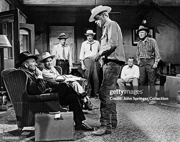 Spencer Tracy as John J. Macreedy , Robert Ryan as Reno Smith , and Lee Marvin as Hector David in the 1955 western Bad Day at Black Rock.